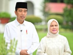 Jokowi dan Iriana Bagikan Makan Siang Buat Anak-Anak Korban Banjir