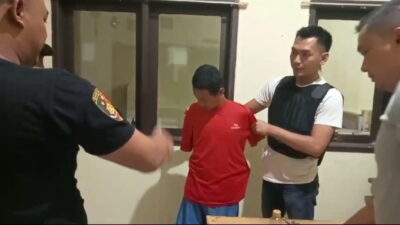 Foto Polisi mengamankan pria yang diduga pelaku mutilasi di Garut