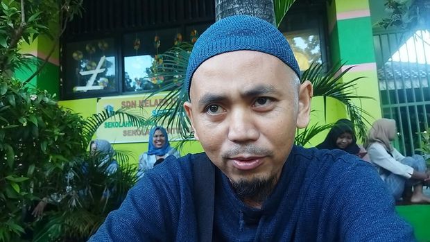 Anang, orang tua siswa SDN 01 Kelapa Dua Wetan, Ciracas, Jaktim